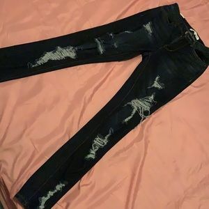 Dark blue ripped jeans